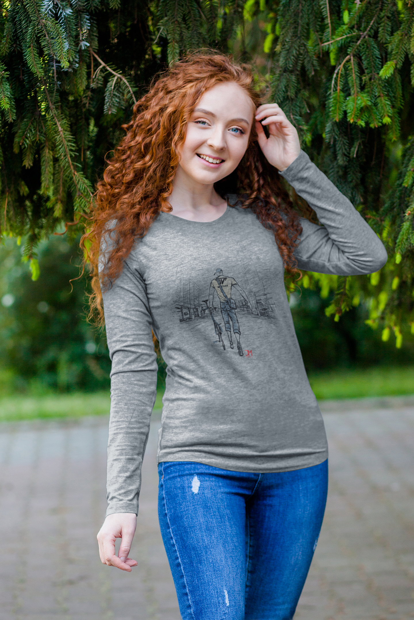 long-sleeve-t-shirt-mockup-of-a-curly-haired-woman-posing-by-a-tree-4727-el1.png