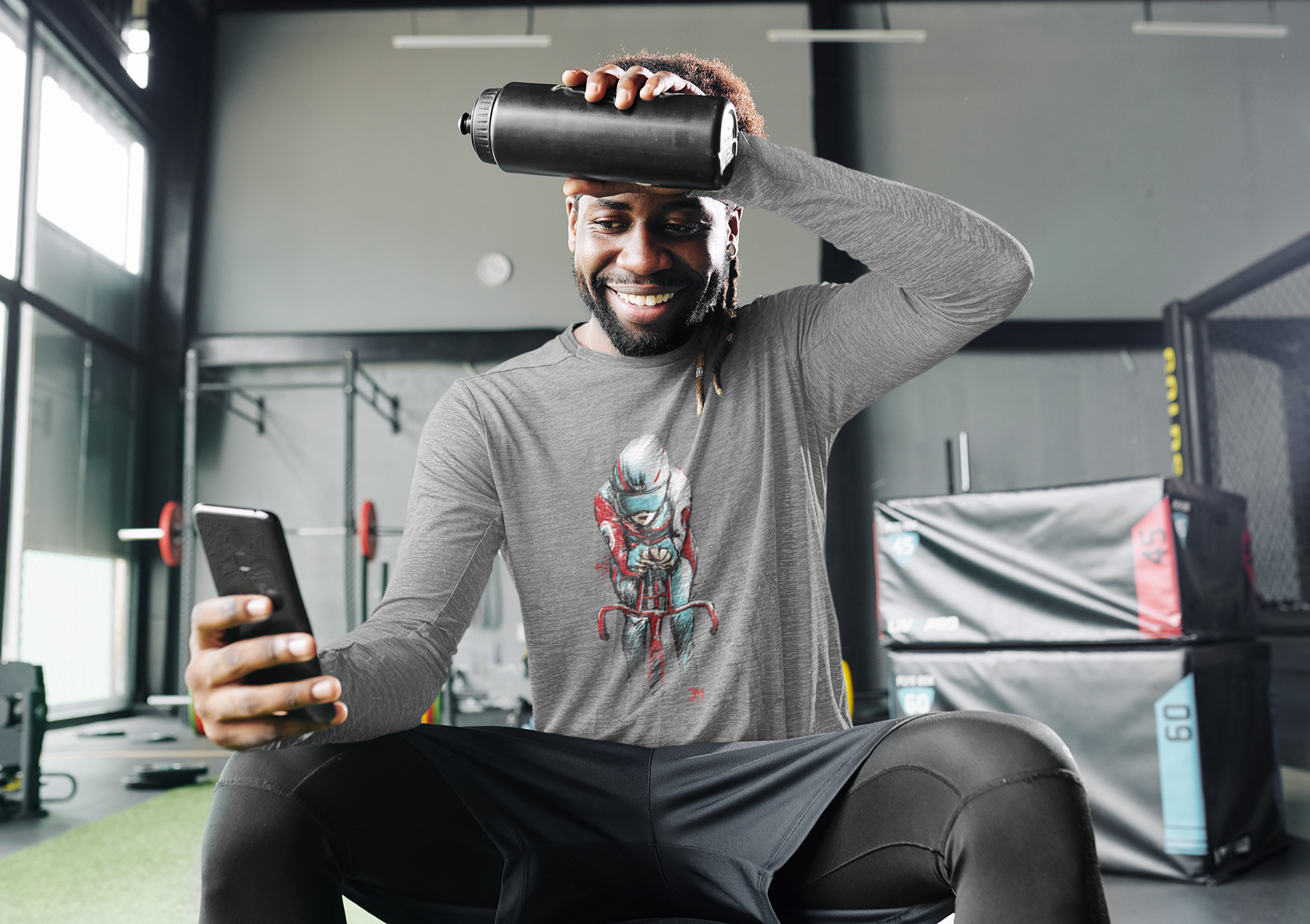 long-sleeve-tee-mockup-of-a-man-checking-his-phone-at-the-gym-39273-r-el2.png