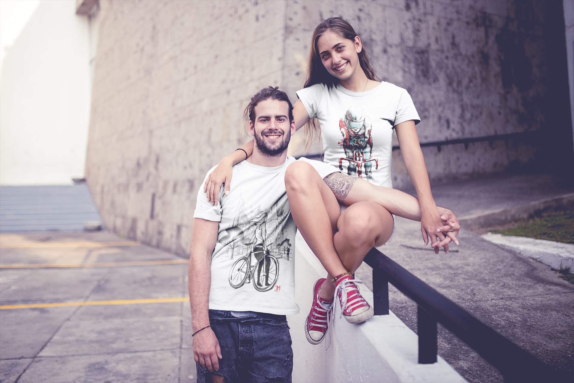 smiling-couple-wearing-t-shirts-mockup-in-an-urban-environment-a20588.png